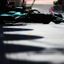 The Aston Martin's AMR21 engine 'bulge' visible as Stroll pulls out of the garage