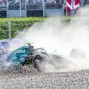 TOPSHOT - Aston Martin's German driver Sebastian Vettel drives into the gravel during the sprint qualifying at the Red Bull Ring race track in Spielberg, Austria, on July 9, 2022, ahead of the Formula One Austrian Grand Prix. (Photo by Johann GRODER / AFP) (Photo by JOHANN GRODER/AFP via Getty Images)
