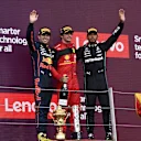 Sergio Perez of Mexico and Oracle Red Bull Racing, Carlos Sainz of Spain and Scuderia Ferrari and Lewis Hamilton of Great Britain and Mercedes AMG Petronas F1 Team in the podium after the British Grand Prix 2022 at Silverstone on July 3, 2022 in Northampton, United Kingdom. (Photo by Jose Hernandez/Anadolu Agency via Getty Images)
