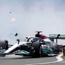 NORTHAMPTON, ENGLAND - JULY 03: George Russell of Great Britain driving the (63) Mercedes AMG Petronas F1 Team W13 crashes at the start during the F1 Grand Prix of Great Britain at Silverstone on July 03, 2022 in Northampton, England. (Photo by Mario Renzi - Formula 1/Formula 1 via Getty Images)
