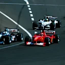 Winner Mika Hakkinen(FIN) Mclaren  MP4-15 gets the jump on Schumacher at the start. Hungarian GP, Hungaroring, 13 August 2000 © Sutton Motorsport Images