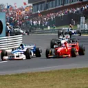 Damon Hill (GBR) Arrows A18 overtakes Michael Schumacher (GER) Ferrari F310B
Hungarian Grand Prix, Rd 11, Budapest, Hungary, 10 August 1997 © Sutton Motorsport Images