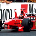 Winner Michael Schumacher (GER), Ferrari F300 celebrates as he crosses the line.
Formula One World Championship, Hungarian Grand Prix, Rd12, Hungaroring, Budapest, Hungary, 16 August 1998. © Sutton Motorsport Images