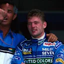 Jos Verstappen (NED) gets some helpful advice from Flavio Briatore (ITA) Benetton F1 Boss, left.
Hungarian Grand Prix, Budapest, 14  August 1994