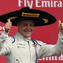 Valtteri Bottas celebrates his third place in Mexico by wearing a sombrero. © Sutton Motorsport Images