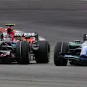 Scott Speed (USA) Scuderia Toro Rosso STR2 battles with Jenson Button (GBR) Honda RA107.
Formula One World Championship, Rd 7, United States Grand Prix, Race, Indianapolis, USA, Sunday 17 June 2007.
DIGITAL IMAGE
 © © Sutton Motorsport Images