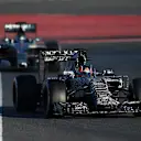 Daniil Kvyat, Red Bull, leads Nico Rosberg, Mercedes