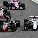 Marcus Ericsson, Alfa Romeo Sauber C37 and Romain Grosjean, Haas F1 Team VF-18 collide at the start of the race during the Brazilian GP on November 11, 2018 in Autodromo Jose Carlos Pace, Brazil. (Photo by Mark Sutton / Sutton Images)