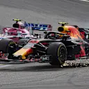 Esteban Ocon, Force India VJM11 Mercedes, collides with race leader Max Verstappen, Red Bull Racing RB14 Tag Heuer during the Brazilian GP on November 11, 2018 in Autodromo Jose Carlos Pace, Brazil. (Photo by Steve Etherington / LAT Images)