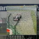 A fans-eye view of the giant screen as Lewis Hamilton (GBR) McLaren Mercedes MP4/22 goes off into the gravel. Formula One World Championship, Rd16, Chinese Grand Prix, Race Day, Shanghai International Circuit, Shanghai, China, Sunday 7 October 2007. ©  Sutton Motorsport Images