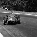 Juan Manuel Fangio engages 'Legend' mode and sends it through the Virage des Six Freres in his Maserati 250F © Michael Tee/LAT Photographic