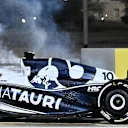 Smoke billows from AlphaTauri's French driver Pierre Gasly's car after it caught fire during the Bahrain Formula One Grand Prix at the Bahrain International Circuit in the city of Sakhir on March 20, 2022. (Photo by Mazen MAHDI / AFP) (Photo by MAZEN MAHDI/AFP via Getty Images)
