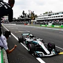 AUTODROMO HERMANOS RODRIGUEZ, MEXICO - OCTOBER 28: Lewis Hamilton, Mercedes-AMG F1 W09 EQ Power+ crosses the line during the Mexican GP at Autodromo Hermanos Rodriguez on October 28, 2018 in Autodromo Hermanos Rodriguez, Mexico. (Photo by Simon Galloway / Sutton Images)