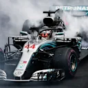 AUTODROMO HERMANOS RODRIGUEZ, MEXICO - OCTOBER 28: Lewis Hamilton, Mercedes AMG F1 W09 EQ Power+, performs donuts after securing his 5th world drivers championship title during the Mexican GP at Autodromo Hermanos Rodriguez on October 28, 2018 in Autodromo Hermanos Rodriguez, Mexico. (Photo by Andy Hone / LAT Images)