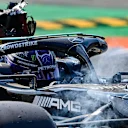 MONZA, ITALY - SEPTEMBER 12: Max Verstappen of the Netherlands driving the (33) Red Bull Racing RB16B Honda and Lewis Hamilton of Great Britain driving the (44) Mercedes AMG Petronas F1 Team Mercedes W12 crash during the F1 Grand Prix of Italy at Autodromo di Monza on September 12, 2021 in Monza, Italy. 
