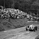 Hans Stuck Snr powers up the Shelsley Walsh hill in his Auto Union Type C in June 1936