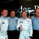 L to R: Winner David Coulthard, Norbert Haug (GER) Mercedes Motorsport boss, Mika Hakkinen and Ron Dennis (GBR) Mclaren boss celebrate their 1-2 victory
French GP, Magny Cours, 2 July 2000 © Sutton Motorsport Images