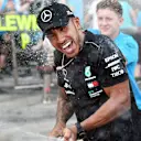 SUZUKA, JAPAN - OCTOBER 07: Lewis Hamilton, Mercedes AMG F1 celebrates with the team and the champagne during the Japanese GP at Suzuka on October 07, 2018 in Suzuka, Japan. (Photo by Mark Sutton / Sutton Images)