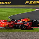 SUZUKA, JAPAN - OCTOBER 07: Kimi Raikkonen, Ferrari SF71H and Max Verstappen, Red Bull Racing RB14 battle during the Japanese GP at Suzuka on October 07, 2018 in Suzuka, Japan. (Photo by Mark Sutton / Sutton Images)