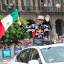 Carlos Sainz waving to the spectators during Infiniti Red Bull Racing F1 Show Run at the Zocalo Plaza in Mexico City on June 27th, 2015 © Marcos Ferro/Red Bull Content Pool