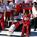 Ayrton Senna (BRA) (Left) and Alain Prost (FRA) (Right) the McLaren Honda team celebrate winning both constructors and drivers championship in record breaking style. McLaren team principal Ron Dennis (GBR) is standing behind Senna. Australian Grand Prix, Adelaide, Australia,13 November 1988.
 © Sutton Motorsport Images