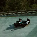 Bruce McLaren negotiates the banking in his Cooper T55. He finished in 3rd place, in the 1961 Italian Grand Prix. © Sutton Motorsport Images