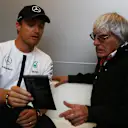 Mercedes' Nico Rosberg in conversation with Formula One group CEO Bernie Ecclestone, Monaco, May 21, 2015 © xpbimages.com