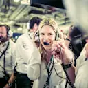 Wife Vivian in the garage ©  Mercedes-Benz Grand Prix Ltd / Paul Ripke