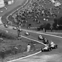 Alberto Ascari (Ferrari 500) leads the field up Eau Rouge at the start of the 1952 Belgian Grand Prix. © LAT Photographic