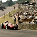Luigi Musso (Ferrari Dino 246) crosses the bridge at the bottom of the hill. 1958 Belgian Grand Prix, Spa-Francorchamps. © LAT Photographic