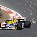 Nigel Mansell (Williams FW11 Honda) 1st position at Eau Rouge. 1986 Belgian Grand Prix. © LAT Photographic