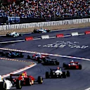 Rubens Barrichello leads the field through the infamous Eau Rouge chicane at the start of the 1994 Belgian Grand Prix. ©Sutton Motorsport Images