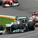 Nico Rosberg (Mercedes) battles with Lewis Hamilton (McLaren) through Eau Rouge. 2011 Belgian Grand Prix. © © Sutton Motorsport Images