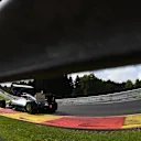 Nico Rosberg (Mercedes AMG F1 W05) as seen through the Eau Rouge Armco. 2014 Belgian Grand Prix. © Sutton Motorsport Images