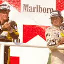 Nelson Piquet (Williams Honda) 1st position with Ayrton Senna (Team Lotus) 2nd position on the podium. Hungaroring, Budapest, Hungary.
8-10 August 1986. World Copyright - LAT Photographic