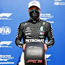 SILVERSTONE, UNITED KINGDOM - AUGUST 08: Pole Sitter Valtteri Bottas, Mercedes-AMG Petronas F1 with the Pirelli pole Position Award during the 70th Anniversary GP at Silverstone on Saturday August 08, 2020 in Northamptonshire, United Kingdom. (Copyright Free for Editorial Use Only. Credit: FIA Pool / LAT Images)