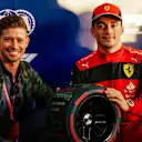 MELBOURNE GRAND PRIX CIRCUIT, AUSTRALIA - APRIL 09: Casey Stoner presents, Charles Leclerc, Ferrari, with the Pirelli Pole Position Trophy during the Australian GP at Melbourne Grand Prix Circuit on Saturday April 09, 2022 in Melbourne, Australia. (Photo by Glenn Dunbar / LAT Images)
