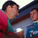 Michael Schumacher (GER) Jordan talks with Eddie Jordan (IRL) Jordan Team owner. 

Formula One World Championship. Belgium Grand Prix, Spa, Belgium. 25 August 1991. © Sutton Motorsport Images