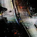 SINGAPORE STREET CIRCUIT, SINGAPORE - SEPTEMBER 14: Pierre Gasly, Scuderia Toro Rosso STR13, and Sergio Perez, Racing Point Force India VJM11 during the Singapore GP at Singapore Street Circuit on September 14, 2018 in Singapore Street Circuit, Singapore. (Photo by Sam Bloxham / LAT Images)