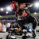 SINGAPORE STREET CIRCUIT, SINGAPORE - SEPTEMBER 16: Kevin Magnussen, Haas F1 Team, exits his car on the grid during the Singapore GP at Singapore Street Circuit on September 16, 2018 in Singapore Street Circuit, Singapore. (Photo by Zak Mauger / LAT Images)