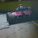 SINGAPORE STREET CIRCUIT, SINGAPORE - SEPTEMBER 16: Esteban Ocon, Racing Point Force India VJM11, crashes out after contact with his team mate at the start during the Singapore GP at Singapore Street Circuit on September 16, 2018 in Singapore Street Circuit, Singapore. (Photo by Zak Mauger / LAT Images)