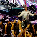 SINGAPORE STREET CIRCUIT, SINGAPORE - SEPTEMBER 16: Lewis Hamilton, Mercedes AMG F1 W09 EQ Power+, celebrates in Parc Ferme after winning the race during the Singapore GP at Singapore Street Circuit on September 16, 2018 in Singapore Street Circuit, Singapore. (Photo by Zak Mauger / LAT Images)