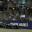 SINGAPORE STREET CIRCUIT, SINGAPORE - SEPTEMBER 16: Lewis Hamilton, Mercedes AMG F1 W09 EQ Power+ celebrates crossing the finish line during the Singapore GP at Singapore Street Circuit on September 16, 2018 in Singapore Street Circuit, Singapore. (Photo by Simon Galloway / Sutton Images)