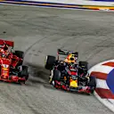 SINGAPORE STREET CIRCUIT, SINGAPORE - SEPTEMBER 16: Sebastian Vettel, Ferrari SF71H and Max Verstappen, Red Bull Racing RB14 battle during the Singapore GP at Singapore Street Circuit on September 16, 2018 in Singapore Street Circuit, Singapore. (Photo by Manuel Goria / Sutton Images)
