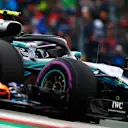 CIRCUIT OF THE AMERICAS, UNITED STATES OF AMERICA - OCTOBER 20: Valtteri Bottas, Mercedes AMG F1 W09 EQ Power+, battles with Fernando Alonso, McLaren MCL33 during the United States GP at Circuit of the Americas on October 20, 2018 in Circuit of the Americas, United States of America. (Photo by Steven Tee / LAT Images)
