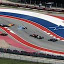 CIRCUIT OF THE AMERICAS, UNITED STATES OF AMERICA - OCTOBER 21: Lance Stroll, Williams FW41 and Fernando Alonso, McLaren MCL33 clash on lap one during the United States GP at Circuit of the Americas on October 21, 2018 in Circuit of the Americas, United States of America. (Photo by Jerry Andre / Sutton Images)