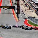 CIRCUIT OF THE AMERICAS, UNITED STATES OF AMERICA - OCTOBER 21: Kimi Raikkonen, Ferrari SF71H and Lewis Hamilton, Mercedes-AMG F1 W09 EQ Power+ battle at the start of the race during the United States GP at Circuit of the Americas on October 21, 2018 in Circuit of the Americas, United States of America. (Photo by Mark Sutton / Sutton Images)