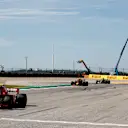 CIRCUIT OF THE AMERICAS, UNITED STATES OF AMERICA - OCTOBER 21: Kimi Raikkonen, Ferrari SF71H, 1st position, takes the chequered flag ahead of Max Verstappen, Red Bull Racing RB14, 2nd position, and Lewis Hamilton, Mercedes AMG F1 W09 EQ Power+, 3rd position during the United States GP at Circuit of the Americas on October 21, 2018 in Circuit of the Americas, United States of America. (Photo by Glenn Dunbar / LAT Images)