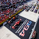 CIRCUIT OF THE AMERICAS, UNITED STATES OF AMERICA - OCTOBER 21: Max Verstappen, Red Bull Racing, 2nd position, Kimi Raikkonen, Ferrari, 1st position, and Lewis Hamilton, Mercedes AMG F1, 3rd position, on the podium during the United States GP at Circuit of the Americas on October 21, 2018 in Circuit of the Americas, United States of America. (Photo by Zak Mauger / LAT Images)