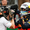 AUTODROMO HERMANOS RODRIGUEZ, MEXICO - OCTOBER 27: Daniel Ricciardo, Red Bull Racing, celebrates pole in front of the cameras during the Mexican GP at Autodromo Hermanos Rodriguez on October 27, 2018 in Autodromo Hermanos Rodriguez, Mexico. (Photo by Zak Mauger / LAT Images)